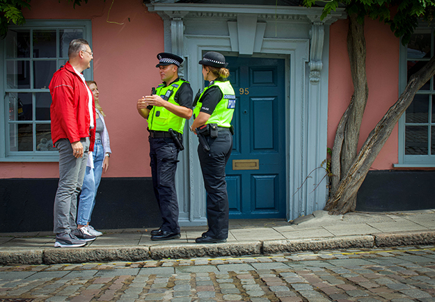 Welcome image of police officers